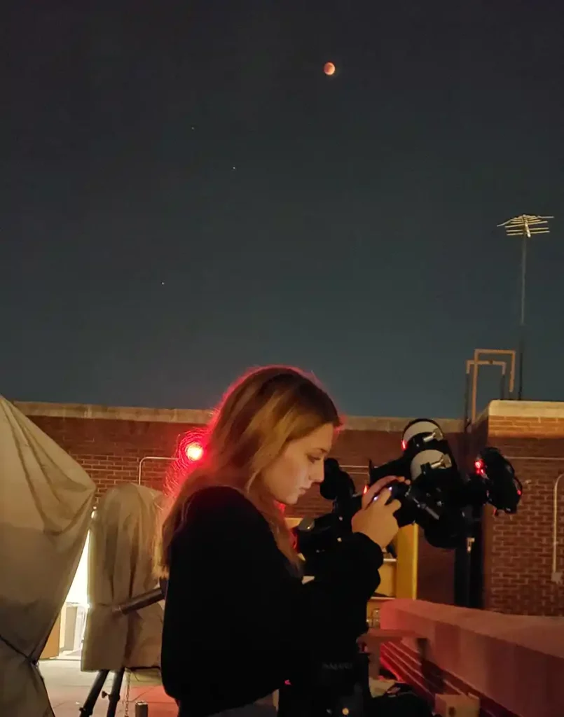 Astronomy Student Ivy Comer exploring the night sky