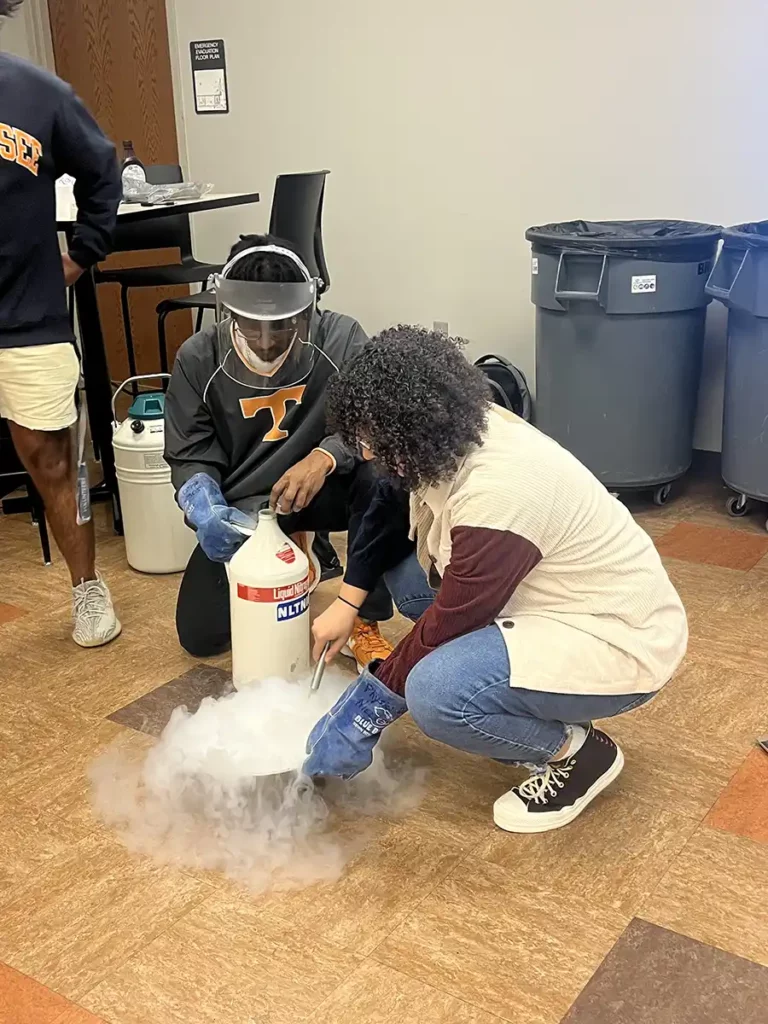 People of Color in Physics Organization outreach with Knoxville Regal Boys and Girls Club, doing an experiment