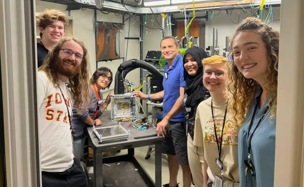 Student at Fermilab working on a detector for particle physics