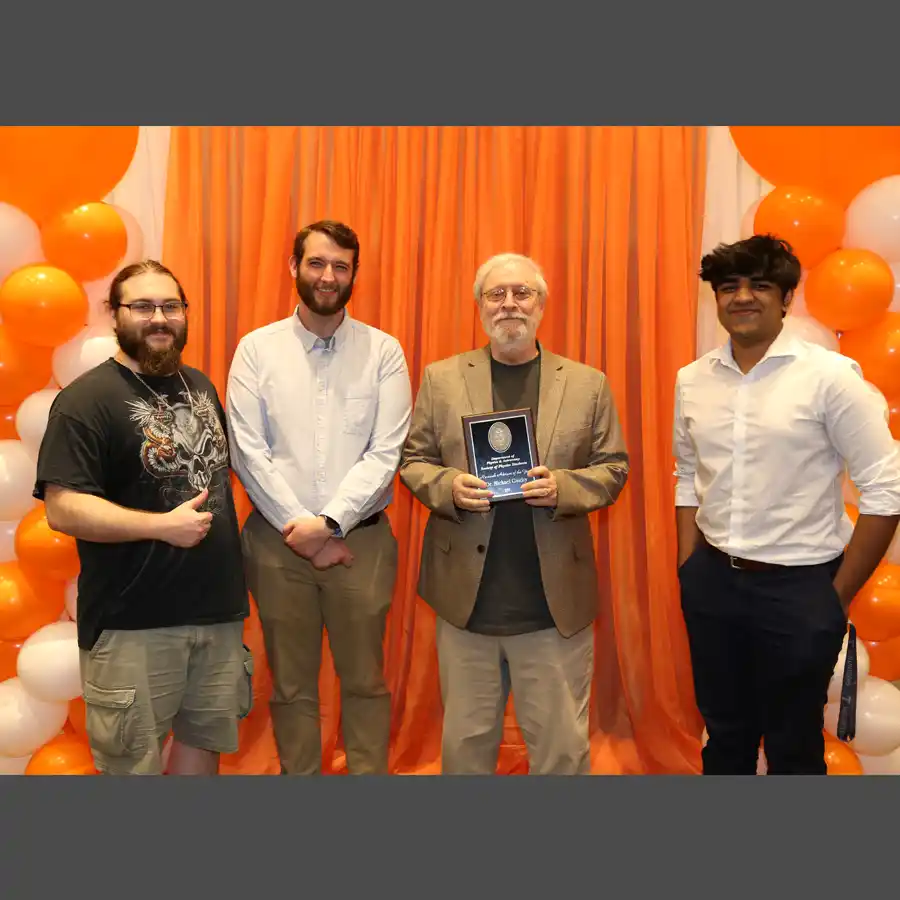 Photo of Michael Guidry with Gage Erwin, Zach Patton and Raghav Chari